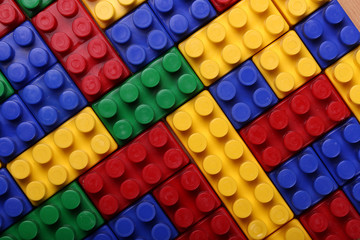 High quality seamless background of colored plastic bricks