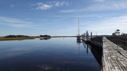 Sailboat on river dock