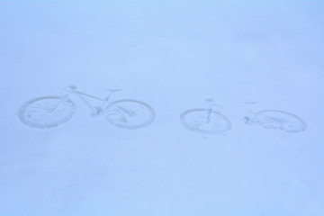 bicycle tracks on snow