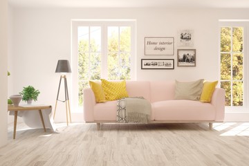 White stylish minimalist room with sofa and autumn landscape in window. Scandinavian interior design. 3D illustration