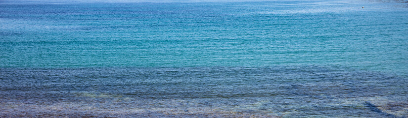 Blue sea water surface. Calm sea background texture, banner