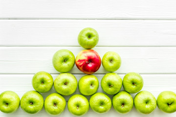 summer fruit pattern with apples on light wooden background top view copyspace
