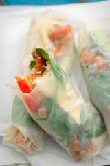Rice paper tofu vegetable rolls with cucumber, spinach and red peppers 