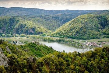 Fototapeta na wymiar Krems an der Donau. Rocky hills and river Donau.