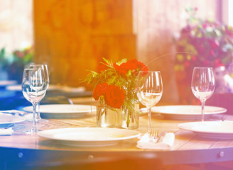 Beautiful table in the restaurant with appliances