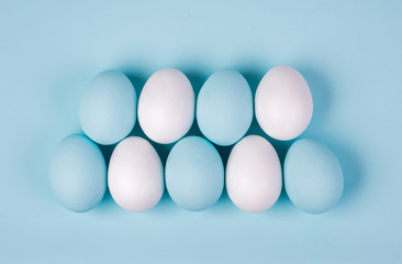 Hand painted easter eggs on clean neutral background. Spring and Easter holiday concept.