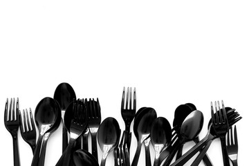 Plastic flatware for eco and Earth protection concept on white background top view mockup