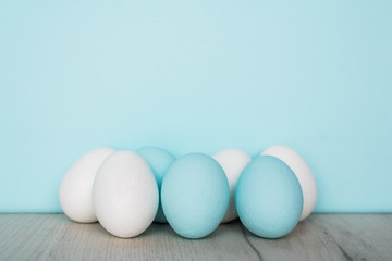 Hand painted easter eggs on clean neutral background. Spring and Easter holiday concept.