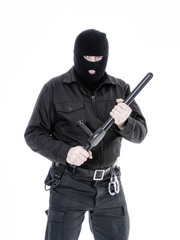 Antiterrorist policeman in black uniform and black balaclava