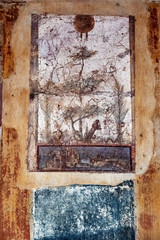 ancient fresco on wall of mythological figures in Pompeii