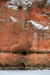 sandstone cliffs with natural caves