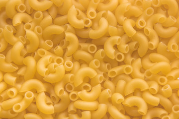 raw russian pasta makaroni background close up