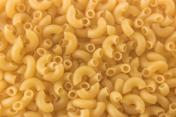 raw russian pasta makaroni background close up