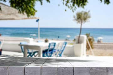 Desk of free space and summer bar on beach 