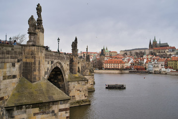 Prague, Czech Republic - March 04, 2019: Charles Bridge over the Vltava River. View of the Old Town - the historic district of Prague