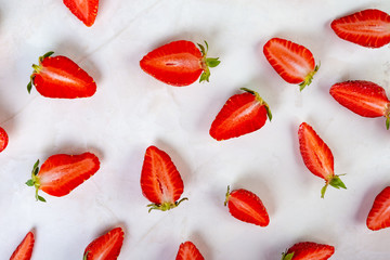 Colorful pattern of strawberries on a white background., top view