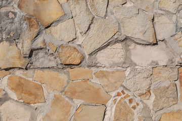 Texture of a stone wall. Old castle stone wall texture background. Stone wall as a background or texture. Part of a stone wall, for background or texture