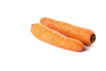 Two washed carrots isolated on white background. Copy space
