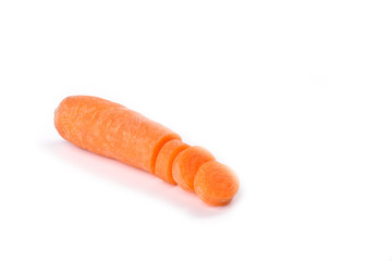 Carrot sliced into round slices isolated on white background.