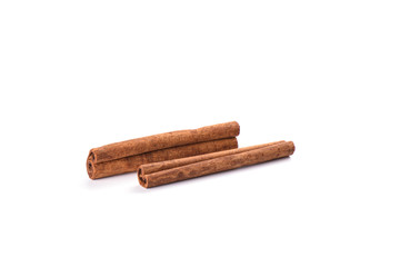 Two cinnamon sticks isolated on white background. Spice concept.