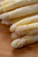 New harvest of white asparagus vegetable in spring season , washed white asparagus ready to cook, spring menu for restaurants