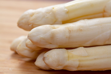 New harvest of white asparagus vegetable in spring season , washed white asparagus ready to cook, spring menu for restaurants