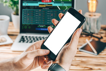 Man celebrating victory after making bets at bookmaker website