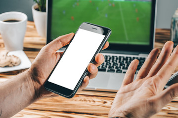 Man celebrating victory after making bets at bookmaker website
