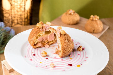 Homemade violet profiterole