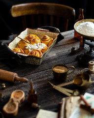 Homemade cinnamon pumpkin rolls in baking pan