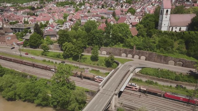 Germany - Drone flight over river Neckar and city Plochingen with church