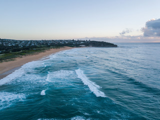Aerial view of Curl Curl beach in the morning. Sydney, Australia.