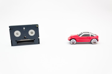 Toy car with Mini DV video tape, Retro concept