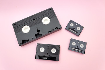 Retro concept video cassettes. VHS and mini DV video tapes