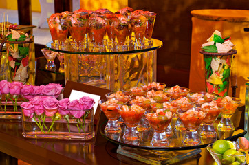 Seafood cocktails and flower decorations for luxury banquet