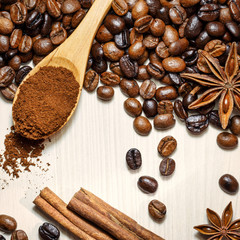 Coffee and spices on a light wooden table
