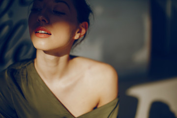 elegant girl in a green blouse