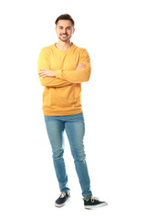 Fototapeta premium Full length portrait of handsome man posing on white background