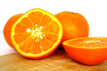 Close up of golden orange isolated on white background with copy and paste space