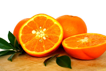 Close up of golden orange isolated on white background with copy and paste space