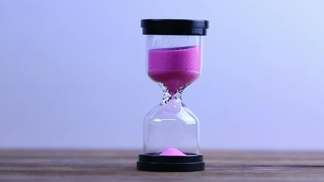 Running Sand in the Sandglass