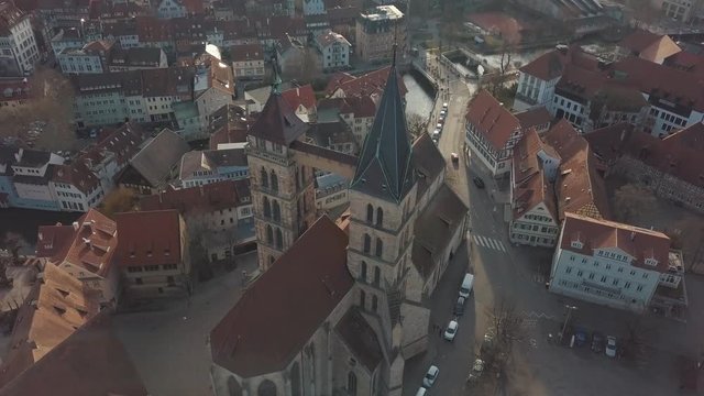 Aerial drone footage of the beautiful medieval german city of Esslingen am Neckar on a bright and sunny day with traditional architecture of Baden Wuerttemberg or Bavaria in Germany
