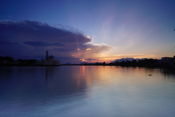 wonderful burning sunset with view  mosque