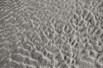 Waves on the sand