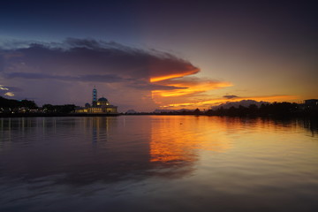 wonderful sunset with islamic mosque and bridge at kuching sarawak