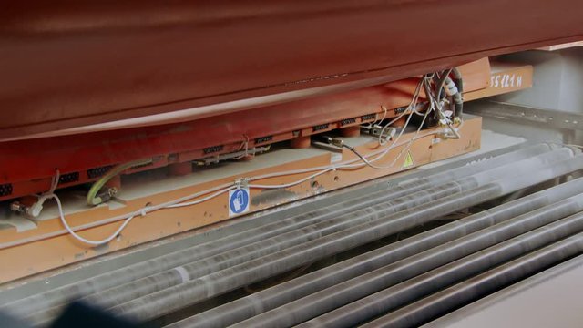 hard industrial press machine is shaping blank for ceramic tile in plant