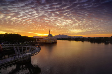 wonderful sunset with islamic mosque and bridge at kuching sarawak