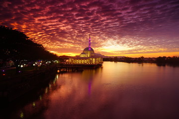 Fototapeta na wymiar wonderful sunset with islamic mosque and bridge at kuching sarawak