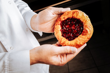 Delicious bun with cherry filling just from the oven