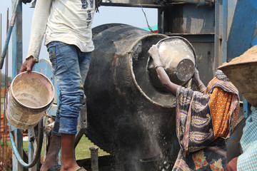 man and women with mixture machine